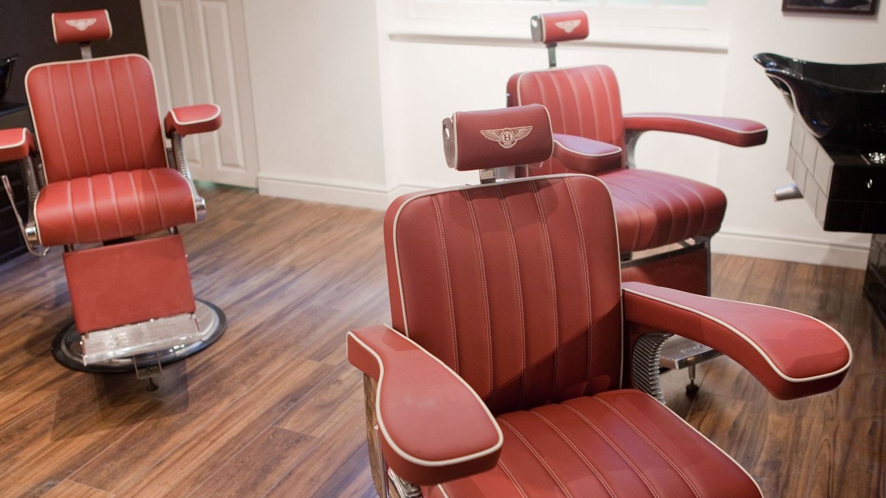 Luxury barbershop interior with premium styling chairs